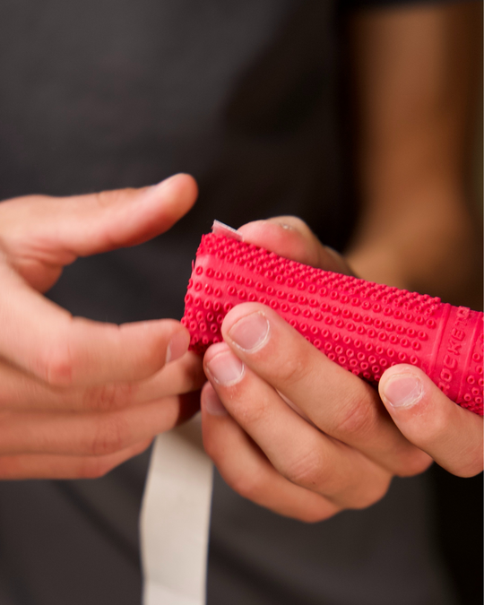 Applying RocketGrip to paddle
